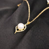 Elegant Pearl Pendant & Earrings Set – Gold-Tone with Crystal Detail