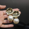 Elegant White Pearl Drop Earrings – Glossy Beads with Gold-Tone Abstract Tops