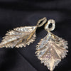 Statement Leaf Drop Earrings – Bold Gold-Tone Textured Design