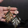 Statement Leaf Drop Earrings – Bold Gold-Tone Textured Design