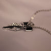 Elegant Black Ribbon Pendant & Earrings Set – Crystal Accents