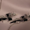 Elegant Black Ribbon Pendant & Earrings Set – Crystal Accents