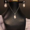Elegant White Teardrop Pendant & Earrings Set – Silver Finish