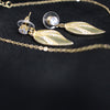Golden Leaf Jewelry Set – Pendant Necklace & Earrings