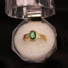 Oval Green Gemstone Ring with Gold Finish and Crystal Halo