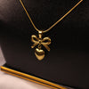 Elegant Gold Bow & Heart Pendant Necklace
