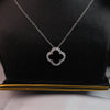 Elegant Clover Pendant Necklace & Stud Earrings Set – Gold & Black Enamel