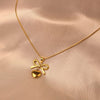 Elegant Gold Bow & Heart Pendant Necklace- Svins Finds